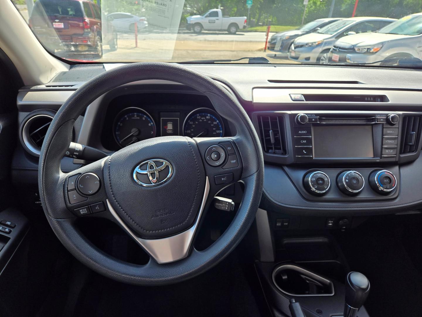 2017 Red Toyota RAV4 LE FWD (2T3ZFREV9HW) with an 2.5L L4 DOHC 16V engine, 6A transmission, located at 503 West Court, Seguin, TX, 78155, (830) 379-3373, 29.568621, -97.969803 - Photo#5